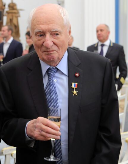 Russian President Vladimir Putin presents Hero of Labor of Russian Federation medals