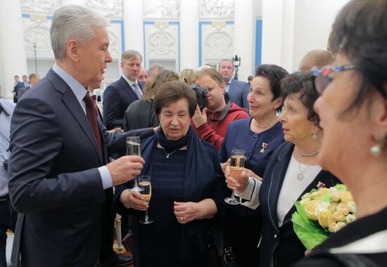 Russian President Vladimir Putin presents Hero of Labor of Russian Federation medals