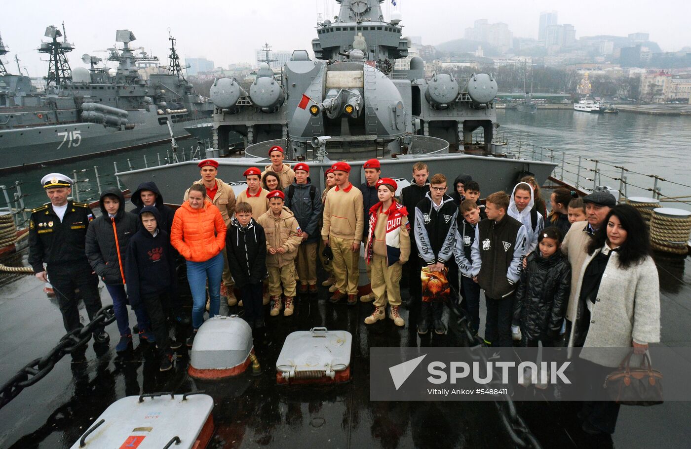 Handing children's letters over to Russian mariners aboard Varyag missile cruiser