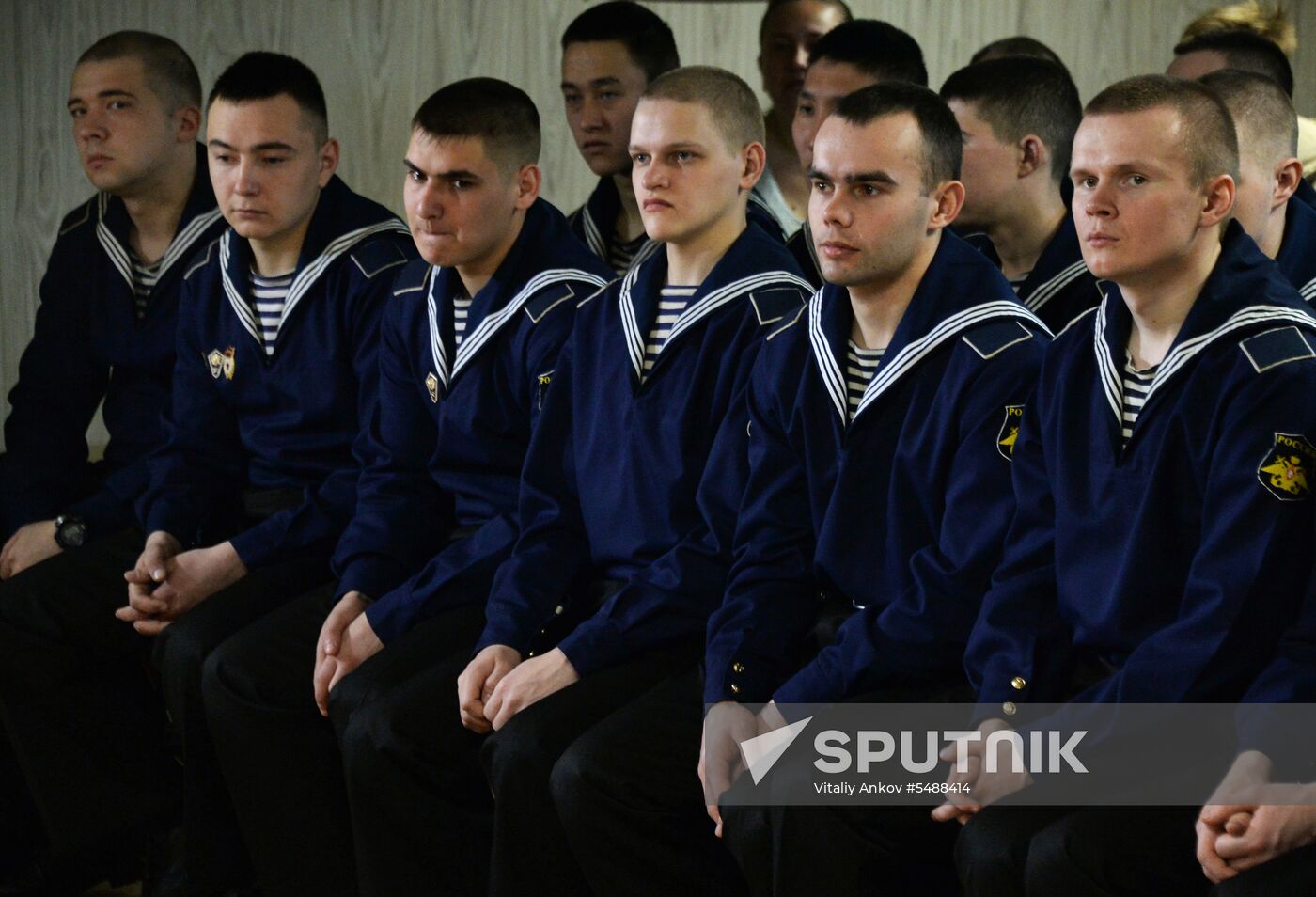 Handing children's letters over to Russian mariners aboard Varyag missile cruiser