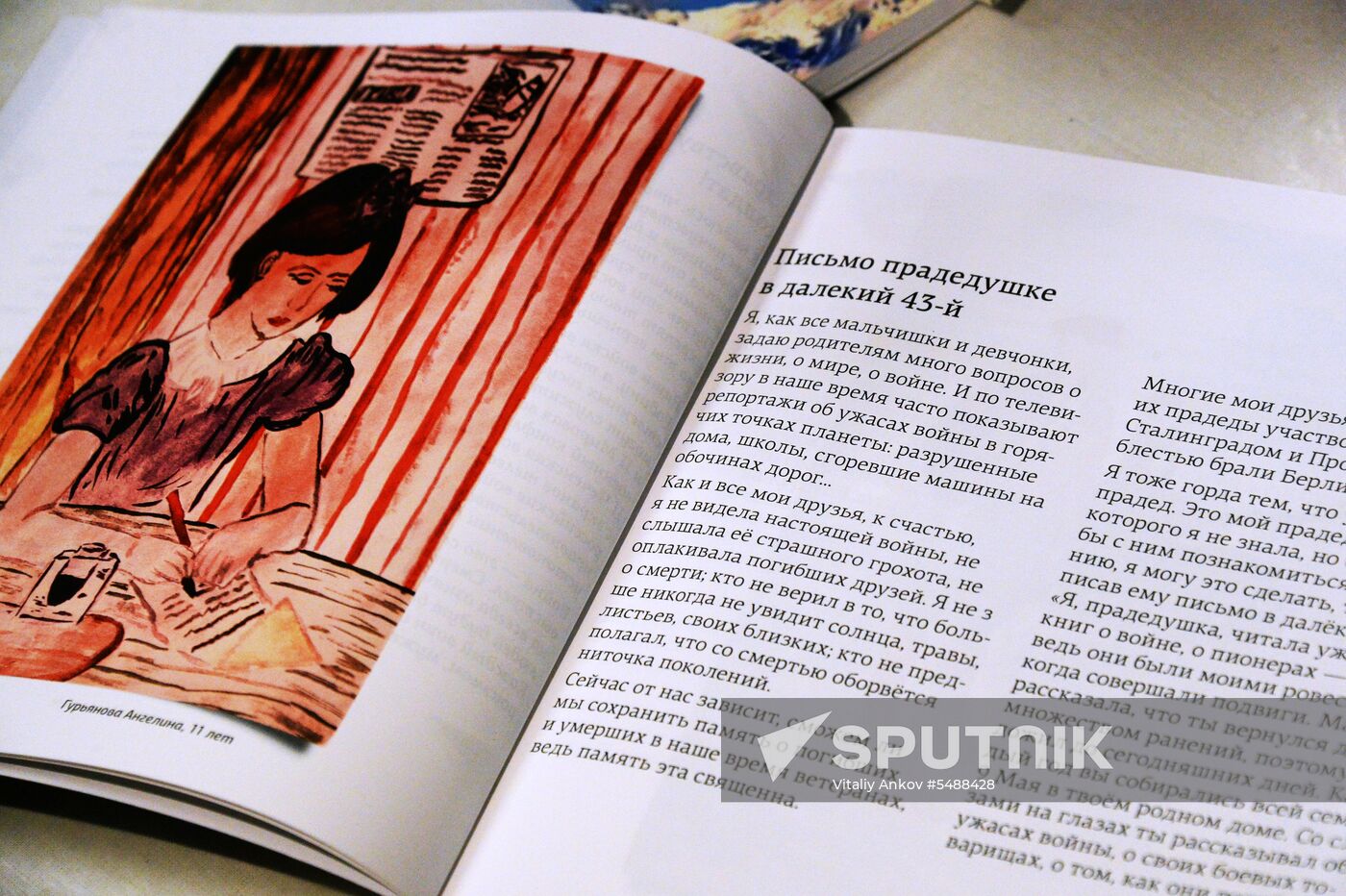 Handing children's letters over to Russian mariners aboard Varyag missile cruiser