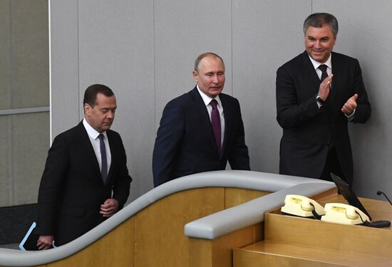 Russian President Vladimir Putin and candidate for Prime Minister Dmitry Medvedev attend State Duma plenary meeting