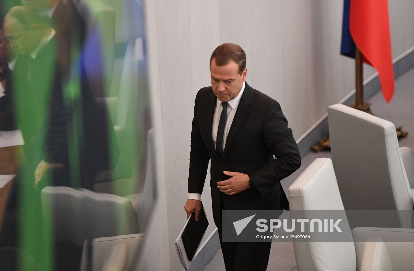 Russian President Vladimir Putin and candidate for Prime Minister Dmitry Medvedev attend State Duma plenary meeting