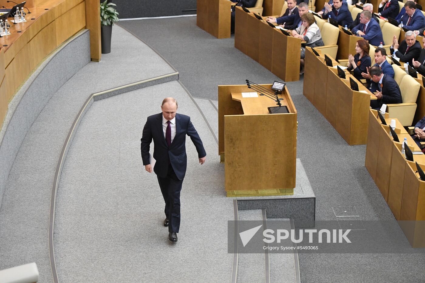 Russian President Vladimir Putin and candidate for Prime Minister Dmitry Medvedev attend State Duma plenary meeting