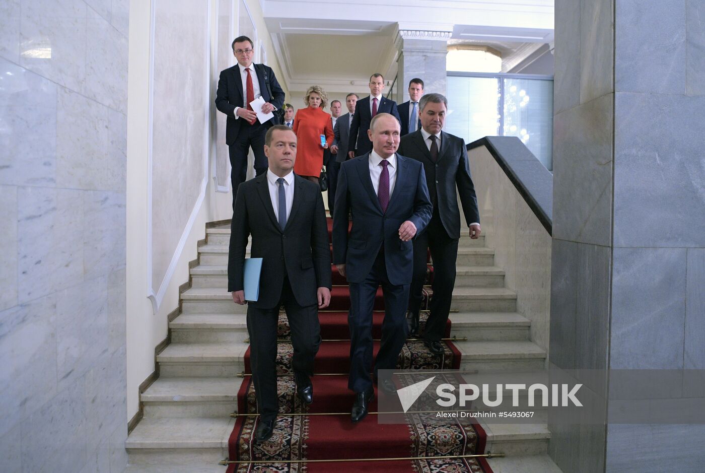 Russian President Vladimir Putin and candidate for Prime Minister Dmitry Medvedev attend State Duma plenary meeting