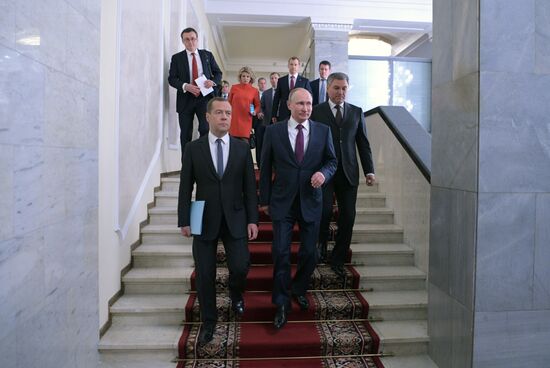 Russian President Vladimir Putin and candidate for Prime Minister Dmitry Medvedev attend State Duma plenary meeting