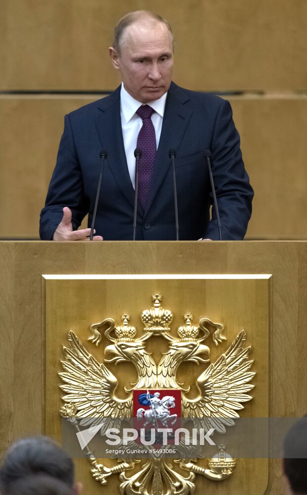 Russian President Vladimir Putin and candidate for Prime Minister Dmitry Medvedev attend State Duma plenary meeting