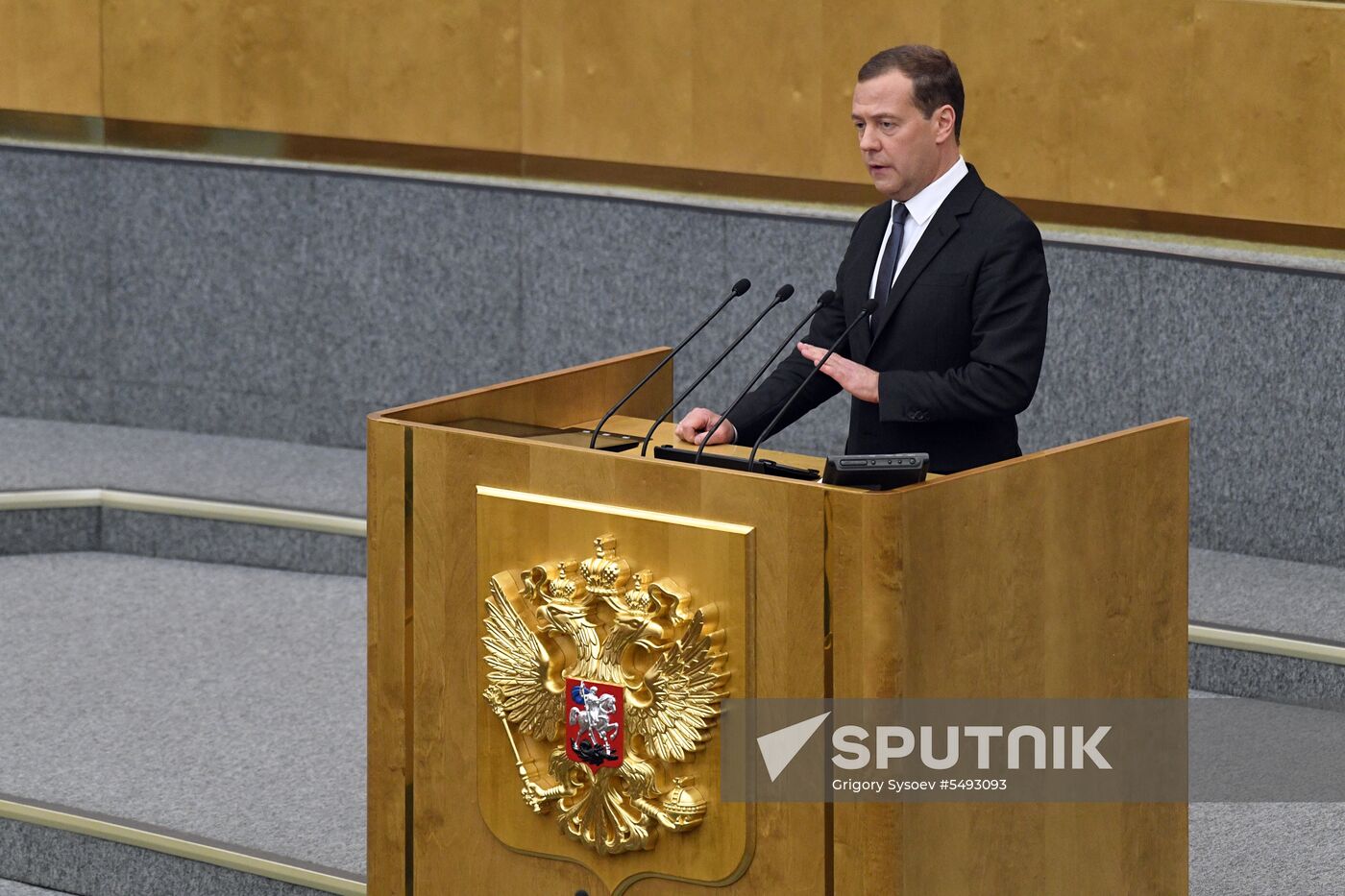 Russian President Vladimir Putin and candidate for Prime Minister Dmitry Medvedev attend State Duma plenary meeting