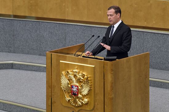 Russian President Vladimir Putin and candidate for Prime Minister Dmitry Medvedev attend State Duma plenary meeting