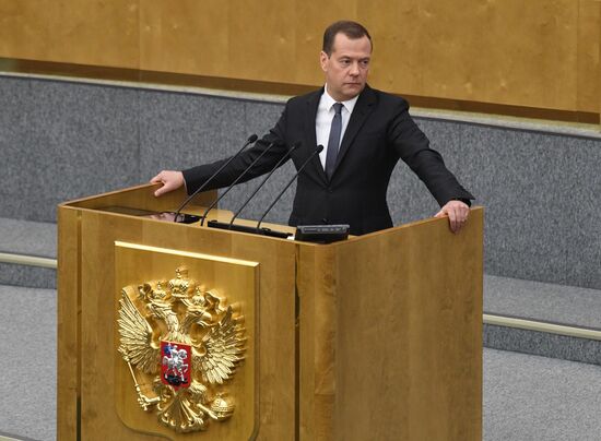 Russian President Vladimir Putin and candidate for Prime Minister Dmitry Medvedev attend State Duma plenary meeting