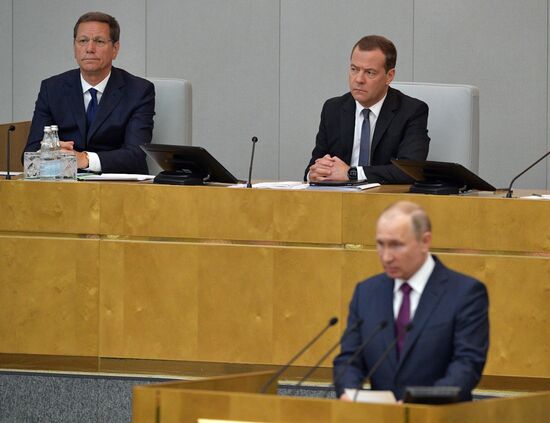 Russian President Vladimir Putin and candidate for Prime Minister Dmitry Medvedev attend State Duma plenary meeting