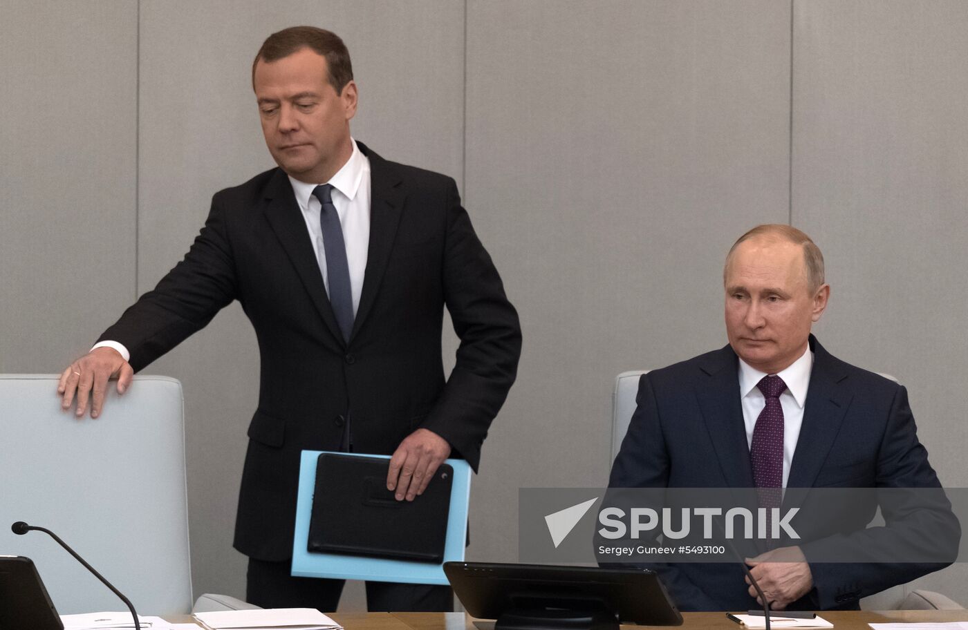 Russian President Vladimir Putin and candidate for Prime Minister Dmitry Medvedev attend State Duma plenary meeting