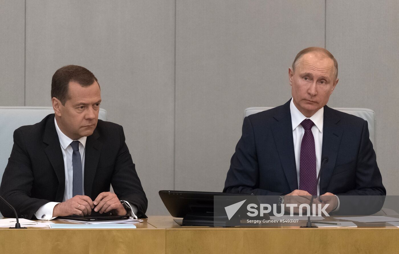 Russian President Vladimir Putin and candidate for Prime Minister Dmitry Medvedev attend State Duma plenary meeting