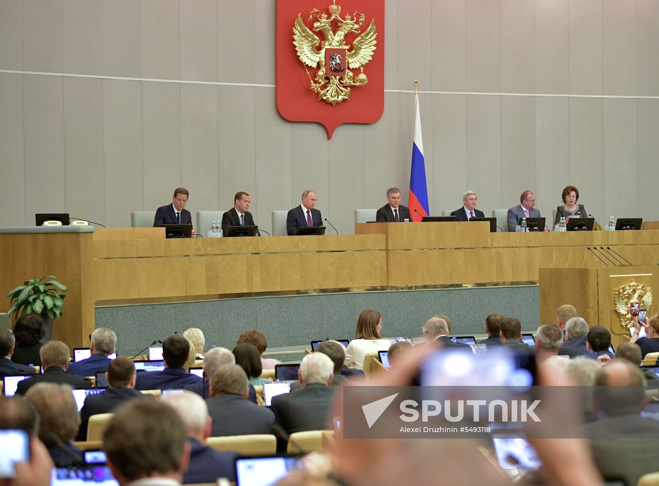 Russian President Vladimir Putin and candidate for Prime Minister Dmitry Medvedev attend State Duma plenary meeting