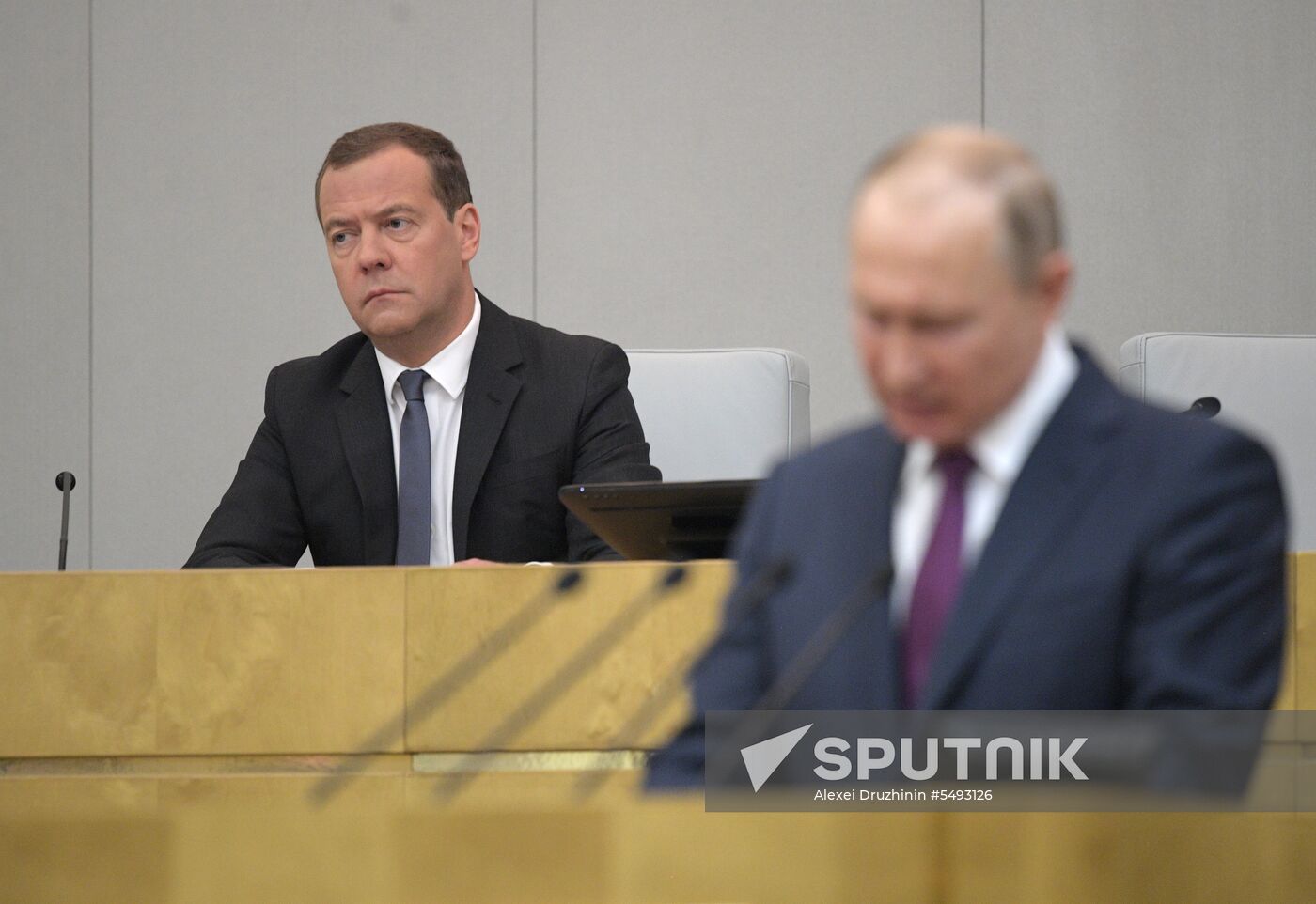 Russian President Vladimir Putin and candidate for Prime Minister Dmitry Medvedev attend State Duma plenary meeting