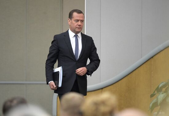 Russian President Vladimir Putin and candidate for Prime Minister Dmitry Medvedev attend State Duma plenary meeting