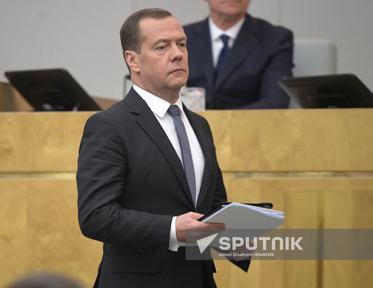 Russian President Vladimir Putin and candidate for Prime Minister Dmitry Medvedev attend State Duma plenary meeting