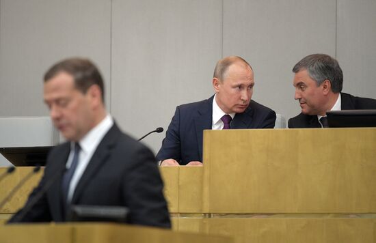 Russian President Vladimir Putin and candidate for Prime Minister Dmitry Medvedev attend State Duma plenary meeting