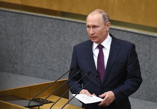 Russian President Vladimir Putin and candidate for Prime Minister Dmitry Medvedev attend State Duma plenary meeting