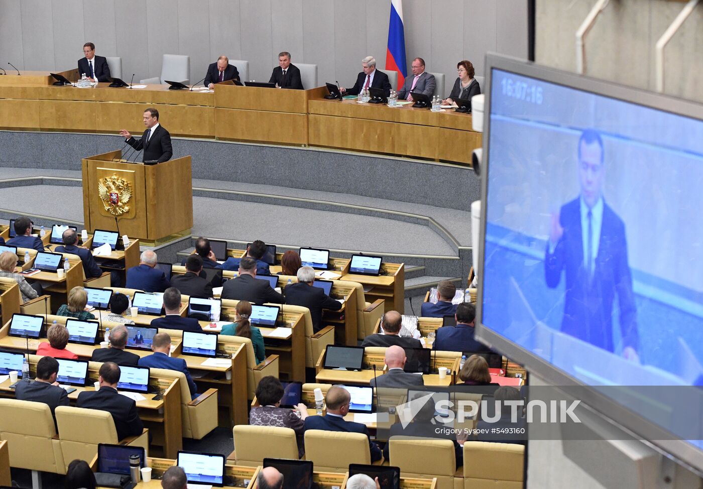 Russian President Vladimir Putin and candidate for Prime Minister Dmitry Medvedev attend State Duma plenary meeting