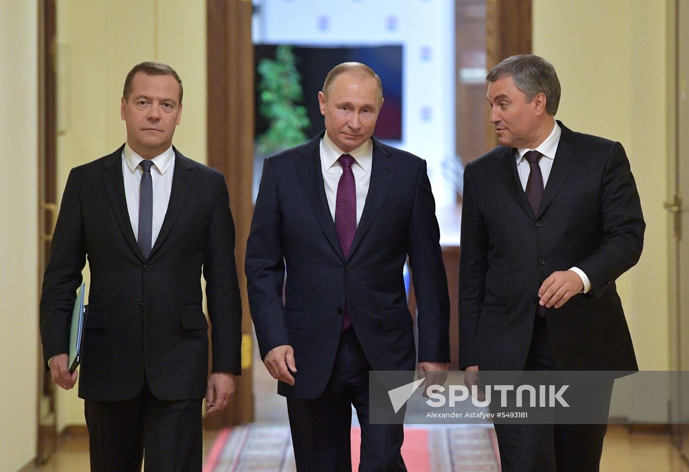 Russian President Vladimir Putin and candidate for Prime Minister Dmitry Medvedev attend State Duma plenary meeting