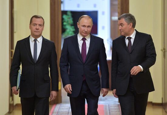 Russian President Vladimir Putin and candidate for Prime Minister Dmitry Medvedev attend State Duma plenary meeting