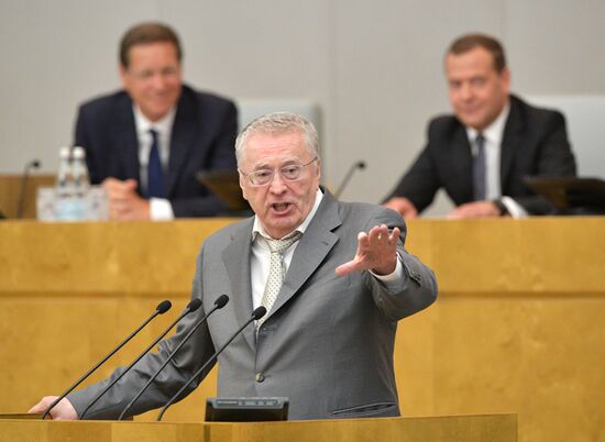 Russian President Vladimir Putin and candidate for Prime Minister Dmitry Medvedev attend State Duma plenary meeting