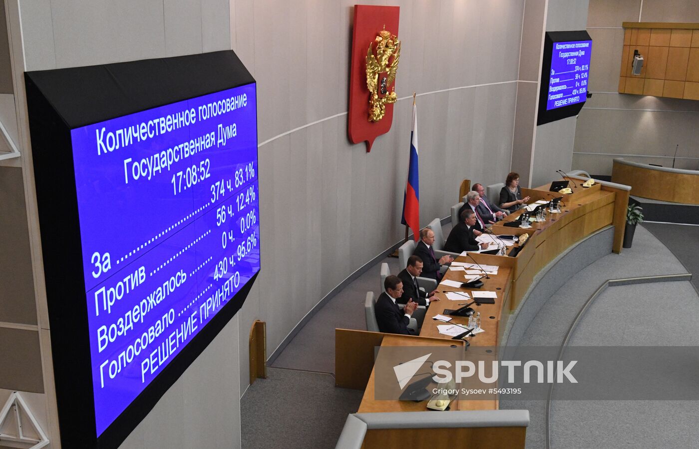 Russian President Vladimir Putin and candidate for Prime Minister Dmitry Medvedev attend State Duma plenary meeting