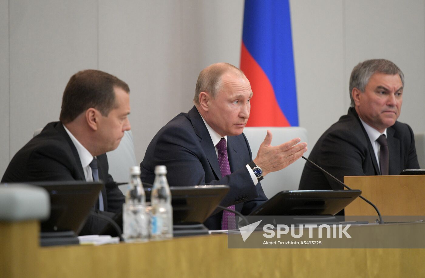 Russian President Vladimir Putin and candidate for Prime Minister Dmitry Medvedev attend State Duma plenary meeting