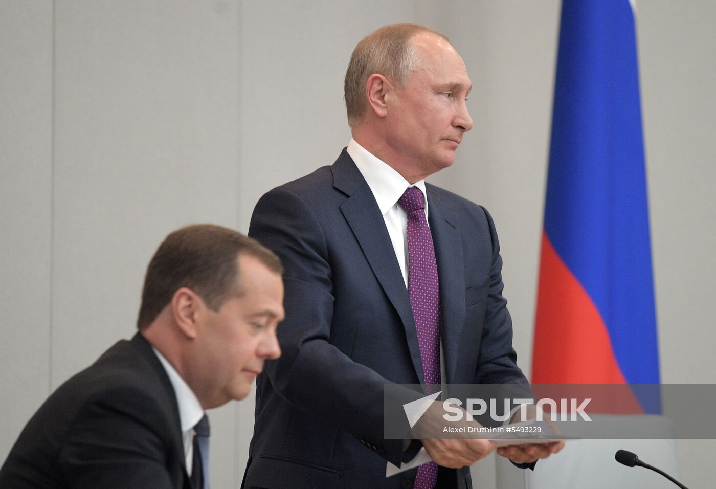 Russian President Vladimir Putin and candidate for Prime Minister Dmitry Medvedev attend State Duma plenary meeting