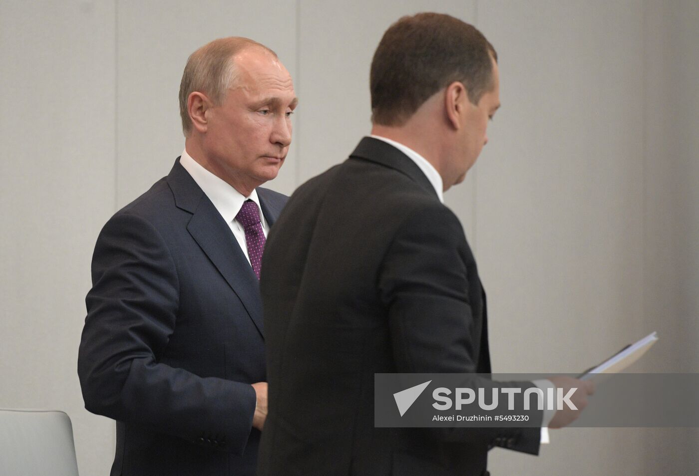 Russian President Vladimir Putin and candidate for Prime Minister Dmitry Medvedev attend State Duma plenary meeting