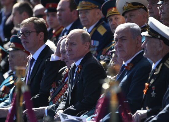 President Vladimir Putin and Prime Minister Dmitry Medvedev at military parade to mark 73rd anniversary of Victory in Great Patriotic War