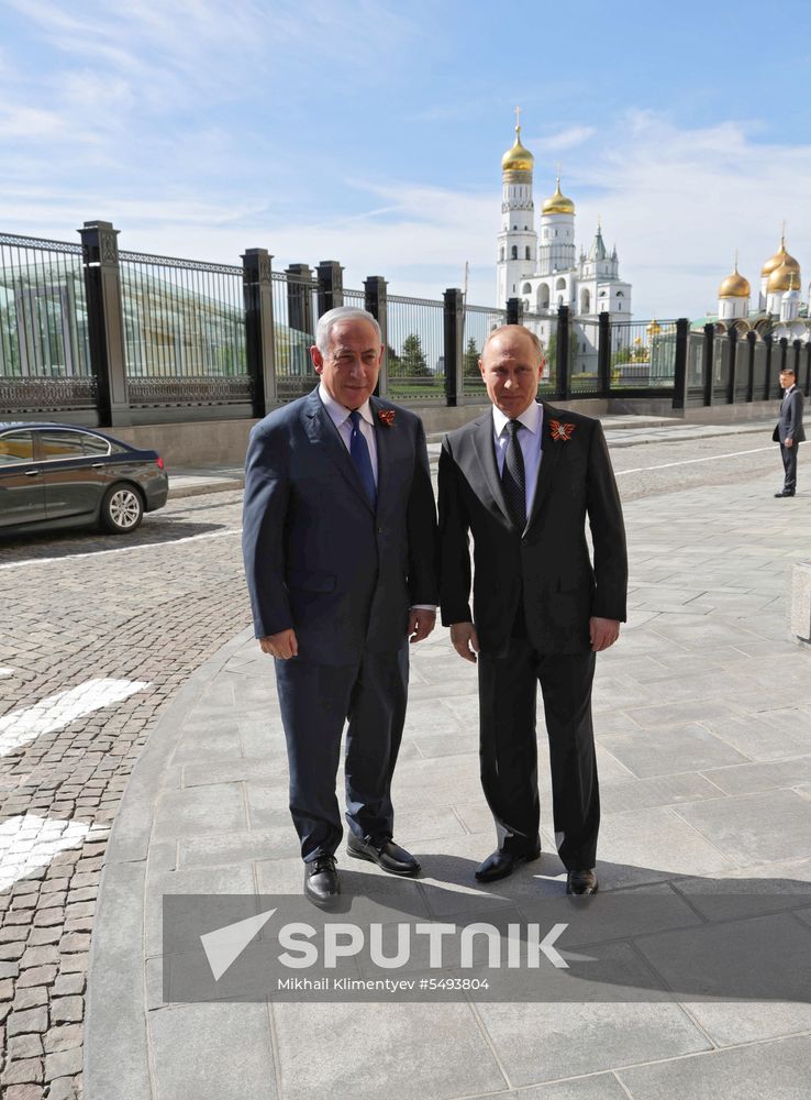 President Vladimir Putin and Prime Minister Dmitry Medvedev at military parade to mark 73rd anniversary of Victory in Great Patriotic War