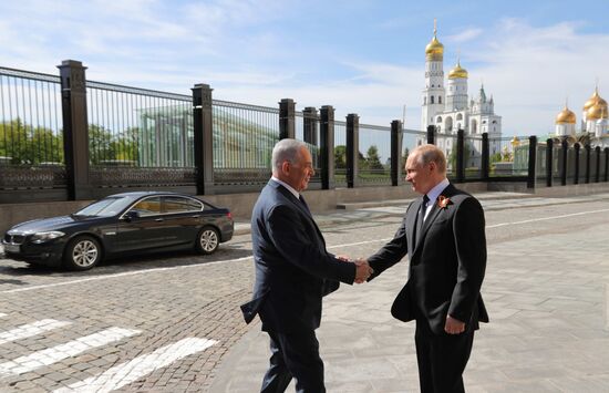 President Vladimir Putin and Prime Minister Dmitry Medvedev at military parade to mark 73rd anniversary of Victory in Great Patriotic War