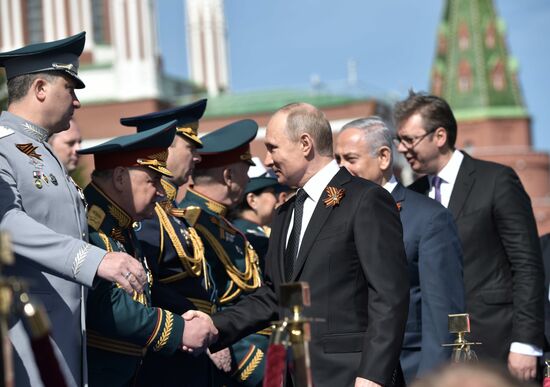 President Vladimir Putin and Prime Minister Dmitry Medvedev at military parade to mark 73rd anniversary of Victory in Great Patriotic War