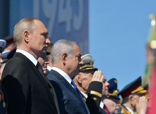 President Vladimir Putin and Prime Minister Dmitry Medvedev at military parade to mark 73rd anniversary of Victory in Great Patriotic War