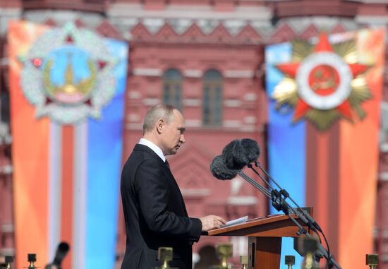 President Vladimir Putin and Prime Minister Dmitry Medvedev at military parade to mark 73rd anniversary of Victory in Great Patriotic War