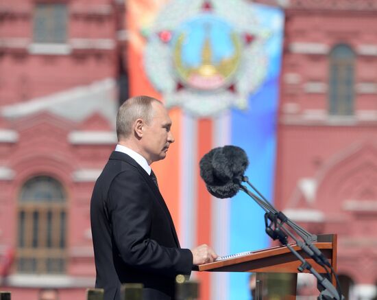 President Vladimir Putin and Prime Minister Dmitry Medvedev at military parade to mark 73rd anniversary of Victory in Great Patriotic War