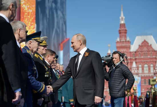 President Vladimir Putin and Prime Minister Dmitry Medvedev at military parade to mark 73rd anniversary of Victory in Great Patriotic War