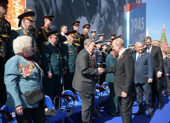 President Vladimir Putin and Prime Minister Dmitry Medvedev at military parade to mark 73rd anniversary of Victory in Great Patriotic War