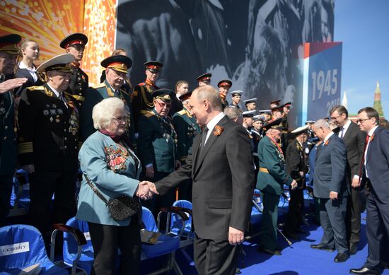 President Vladimir Putin and Prime Minister Dmitry Medvedev at military parade to mark 73rd anniversary of Victory in Great Patriotic War