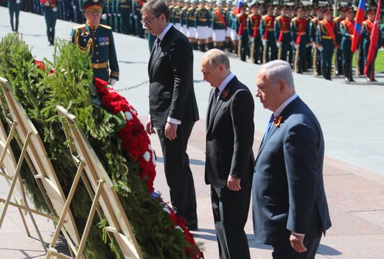 President Vladimir Putin and Prime Minister Dmitry Medvedev at wreath-laying ceremony at Unknown Soldiers' Tomb