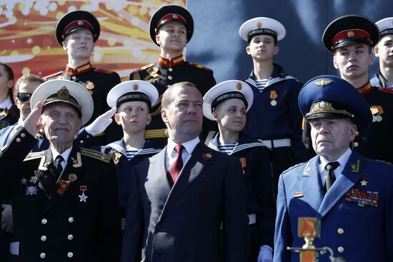 President Vladimir Putin and Prime Minister Dmitry Medvedev at military parade to mark 73rd anniversary of Victory in Great Patriotic War