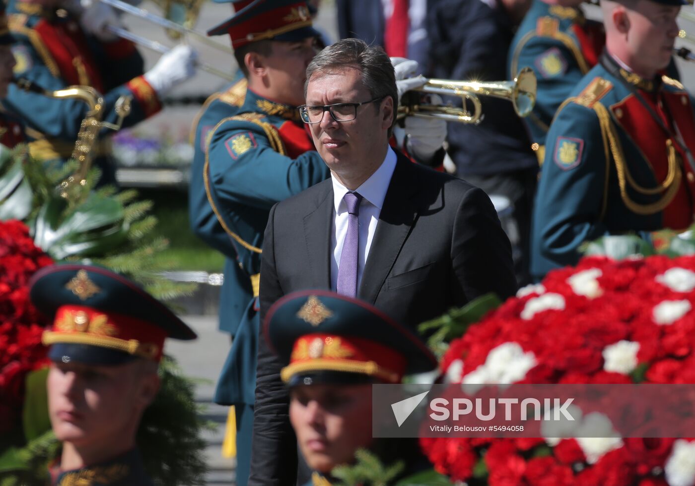 President Vladimir Putin and Prime Minister Dmitry Medvedev at wreath-laying ceremony at Unknown Soldiers' Tomb