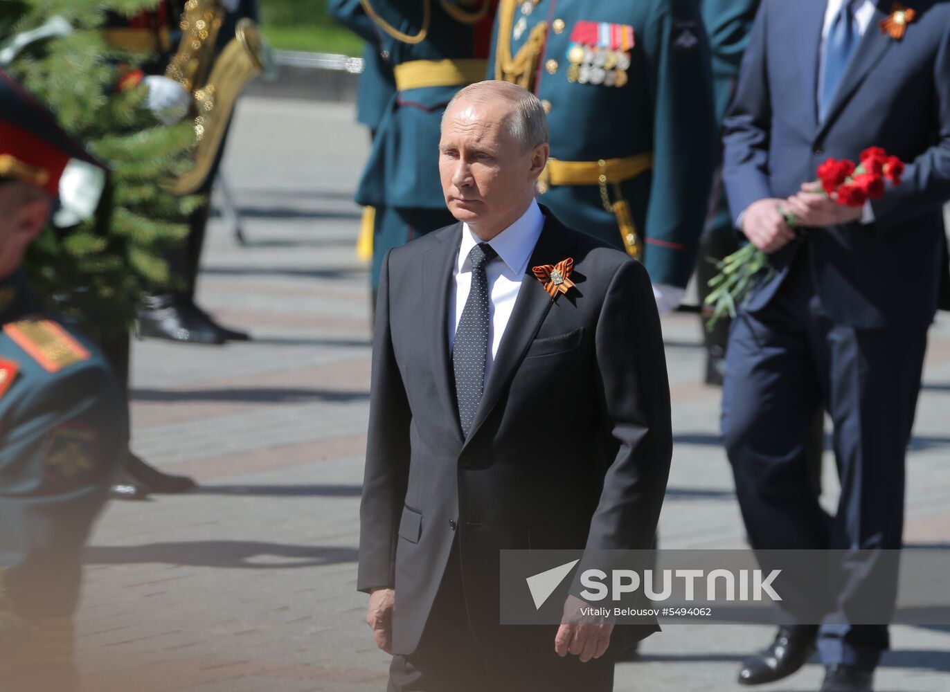 President Vladimir Putin and Prime Minister Dmitry Medvedev at wreath-laying ceremony at Unknown Soldiers' Tomb