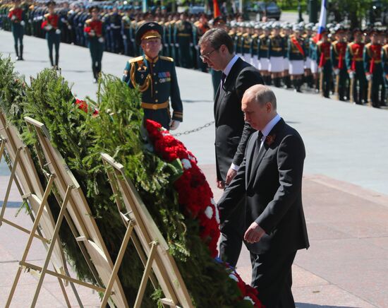 President Vladimir Putin and Prime Minister Dmitry Medvedev at wreath-laying ceremony at Unknown Soldiers' Tomb