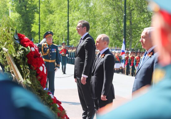 President Vladimir Putin and Prime Minister Dmitry Medvedev at wreath-laying ceremony at Unknown Soldiers' Tomb