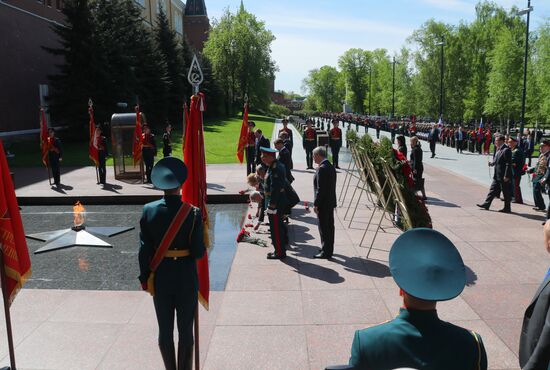 President Vladimir Putin and Prime Minister Dmitry Medvedev at wreath-laying ceremony at Unknown Soldiers' Tomb