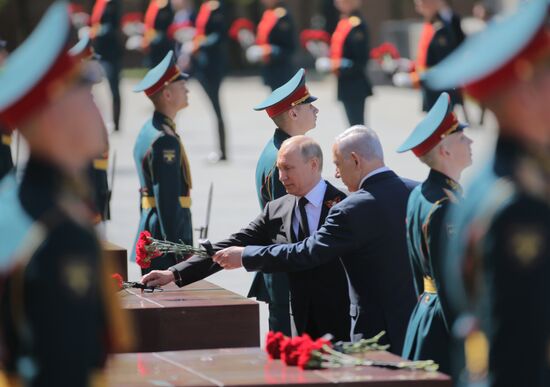President Vladimir Putin and Prime Minister Dmitry Medvedev at wreath-laying ceremony at Unknown Soldiers' Tomb