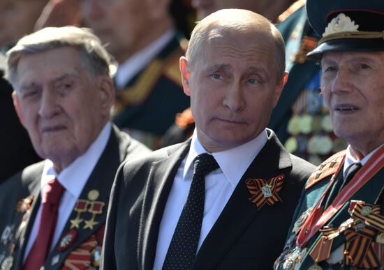 President Vladimir Putin and Prime Minister Dmitry Medvedev at military parade to mark 73rd anniversary of Victory in Great Patriotic War